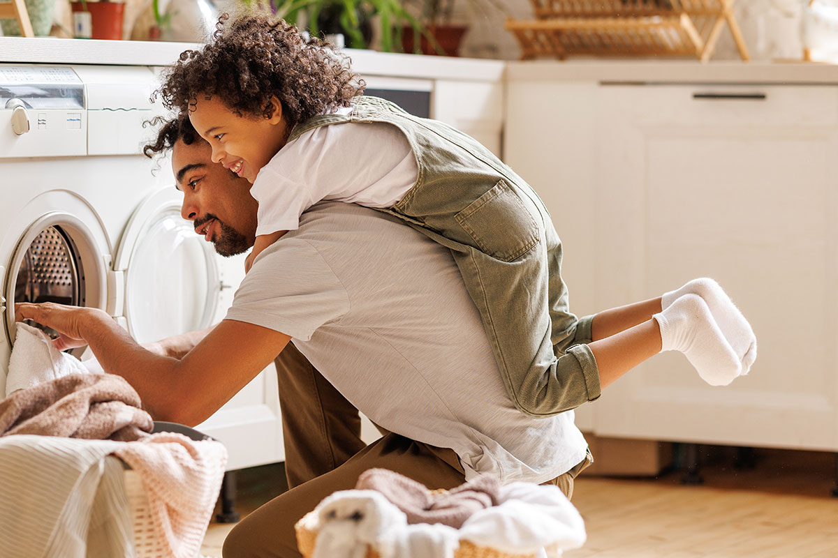 Father and son bonding after signing up for marketplace plan